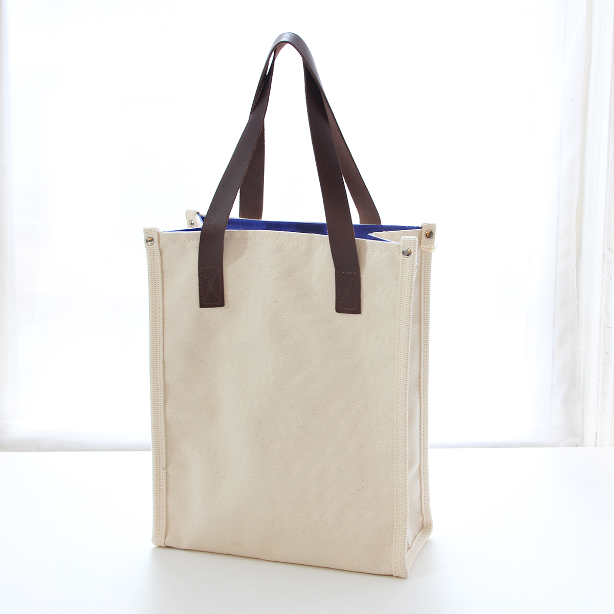 Leather handle tote