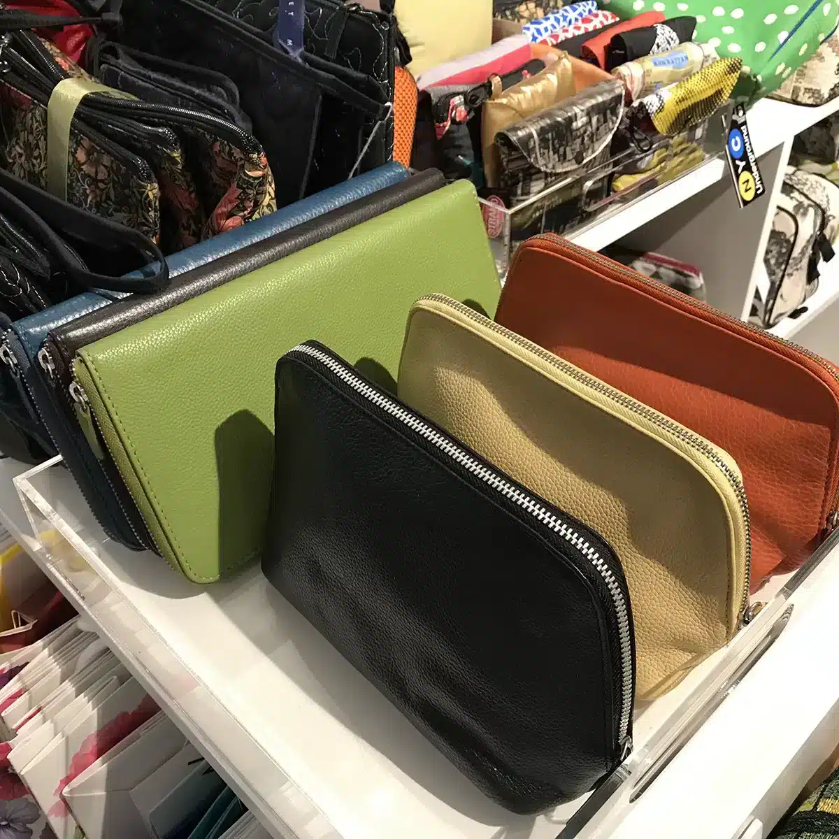 Samples of custom color leather cosmetic bags in the Gouda showroom