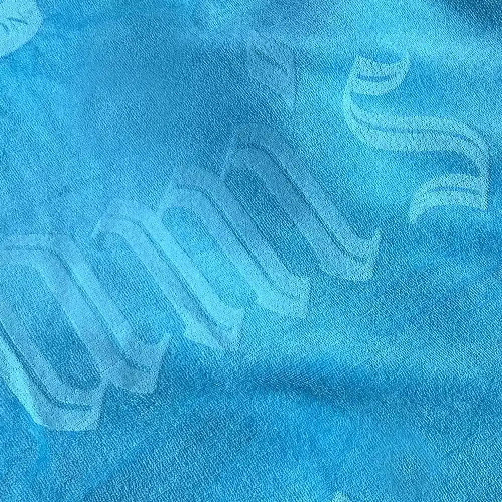 Logo Towel Detail - Monochrome